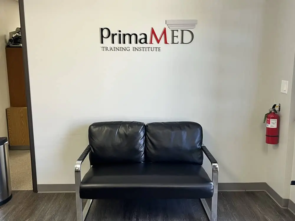 Admissions lounge featuring program brochures and campus highlights